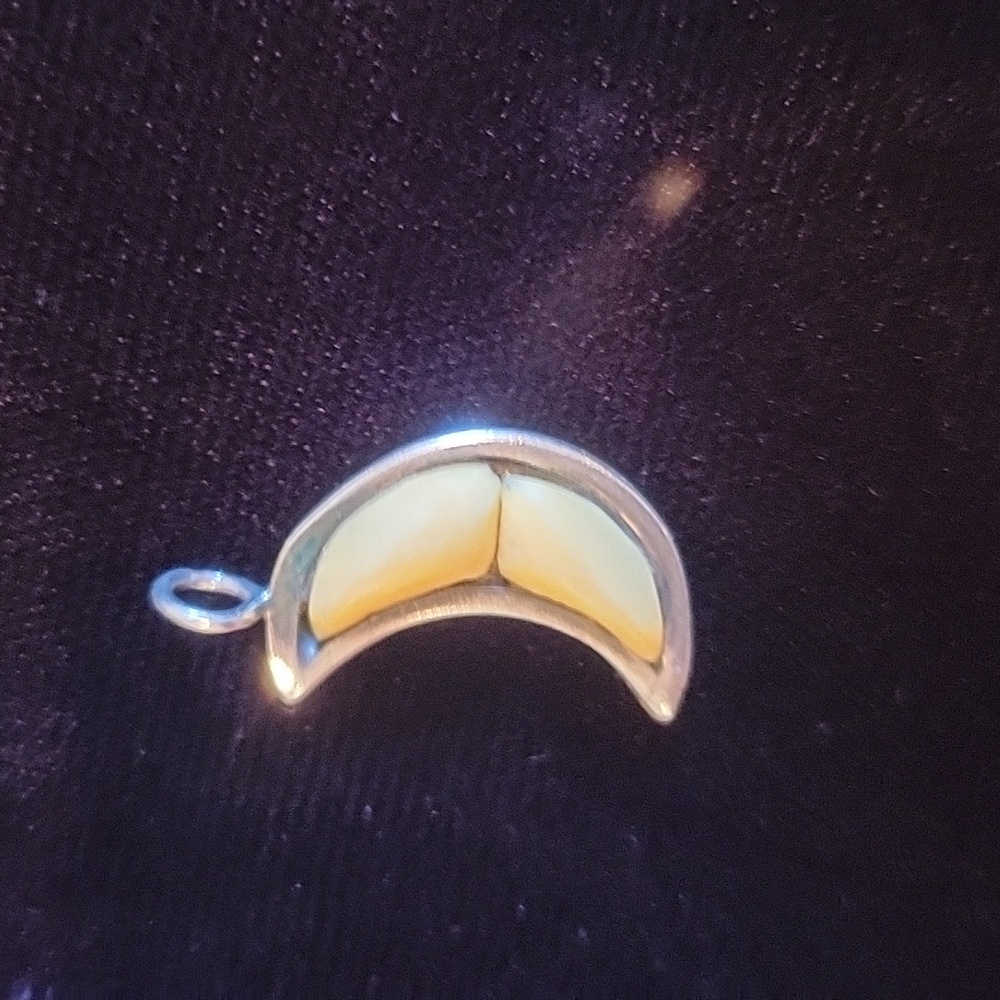 Quarter moon silver and ivory pendant
